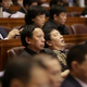 Illustration for article titled Chinese Politicians Ordered To Stop Playing With Their Phones